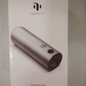 New In Box. Silver Portable Charger With Sanitizer Abilities